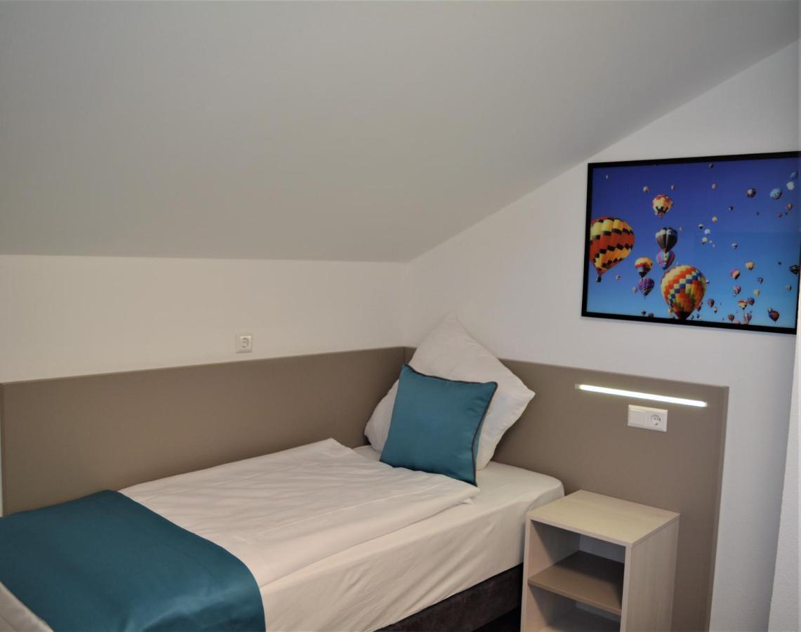 Single Room Shared Shower Toilet